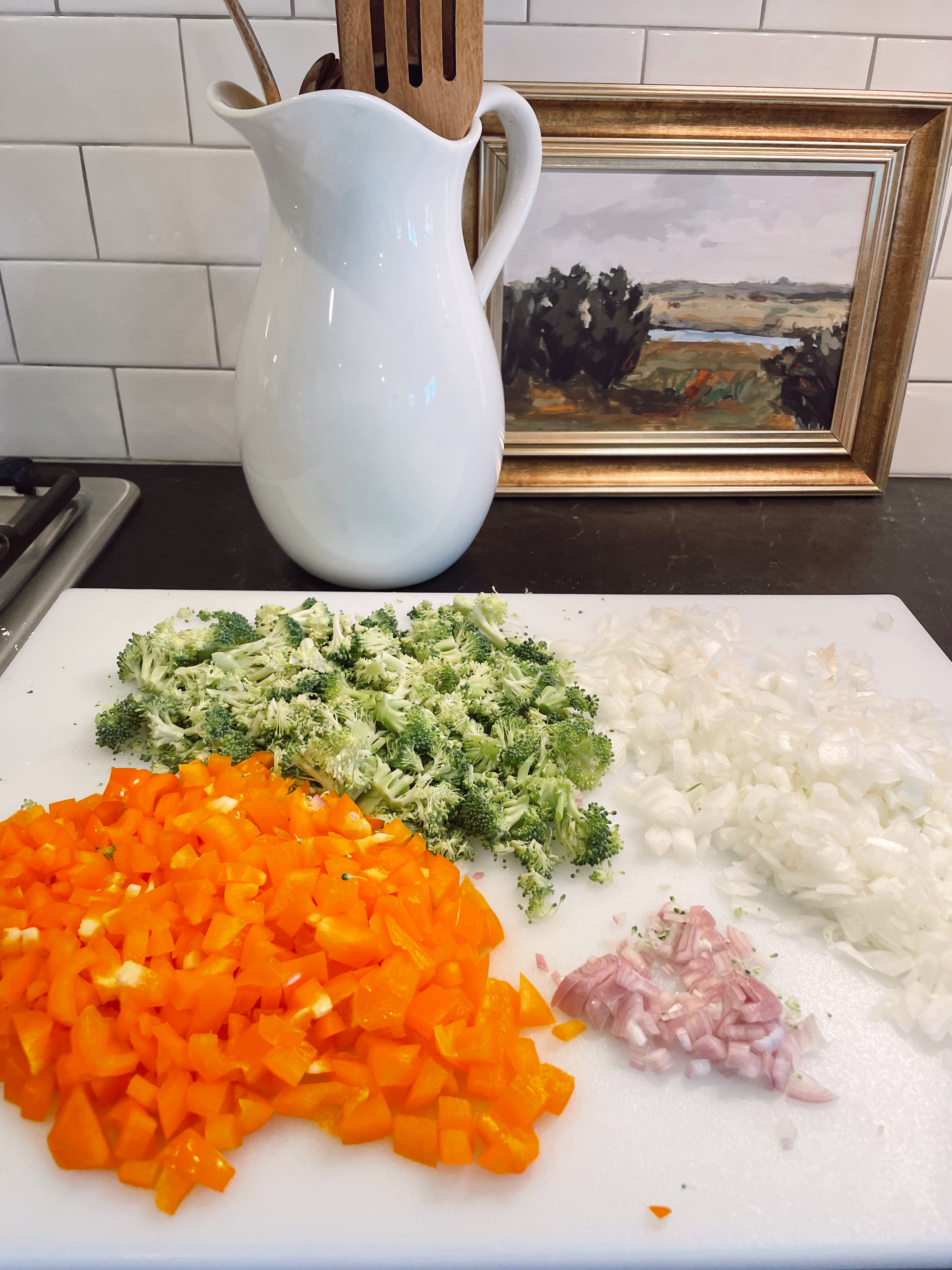 Chopped vegetables for freezer meals on counter top 