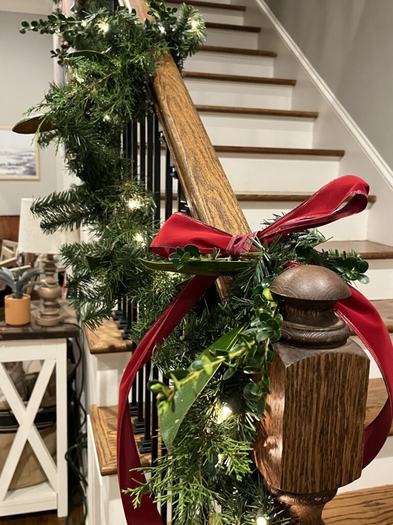 Natural Christmas staircase garland after 