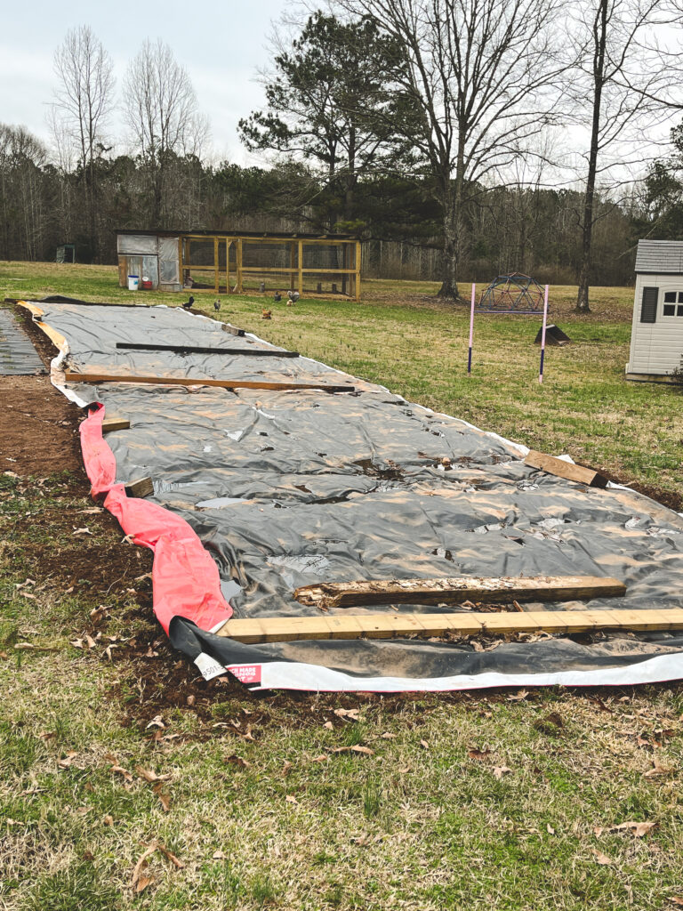 Covering the garden in fall for spring planting. 