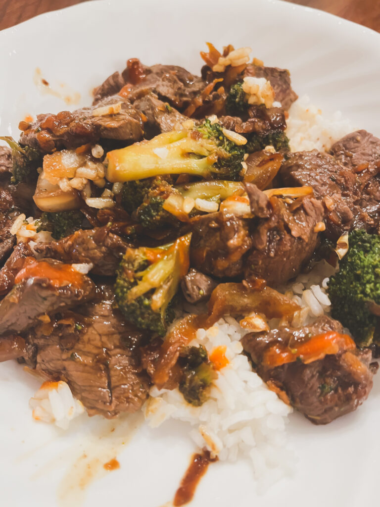 White plate with stir fry and rice