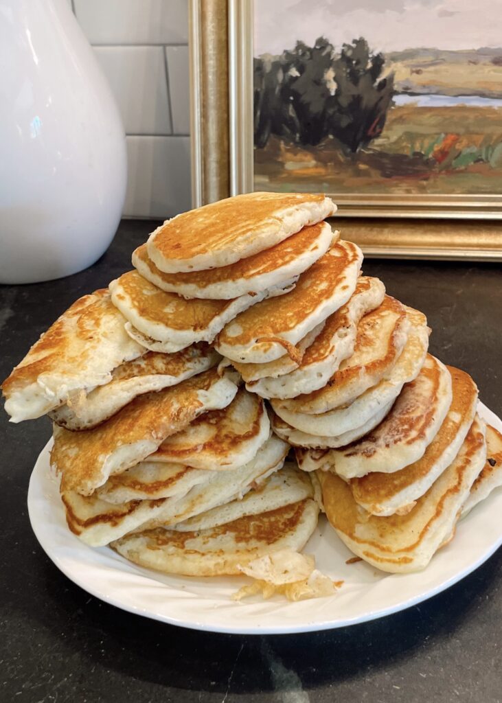 Stack of sourdough pancakes on a breakfast plate 