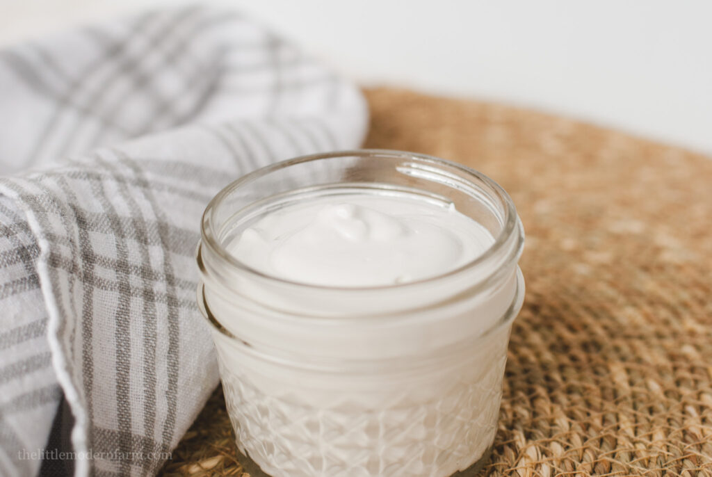 1 jar natural lotion on a woven surface 