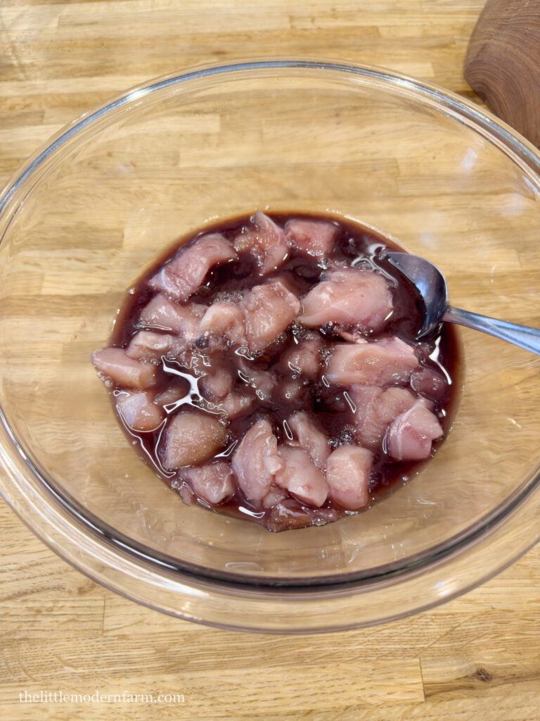 Chicken in a bowl with red wine sauce 