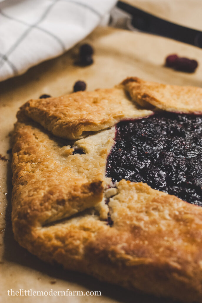 Blackberry galette on parchment paper 