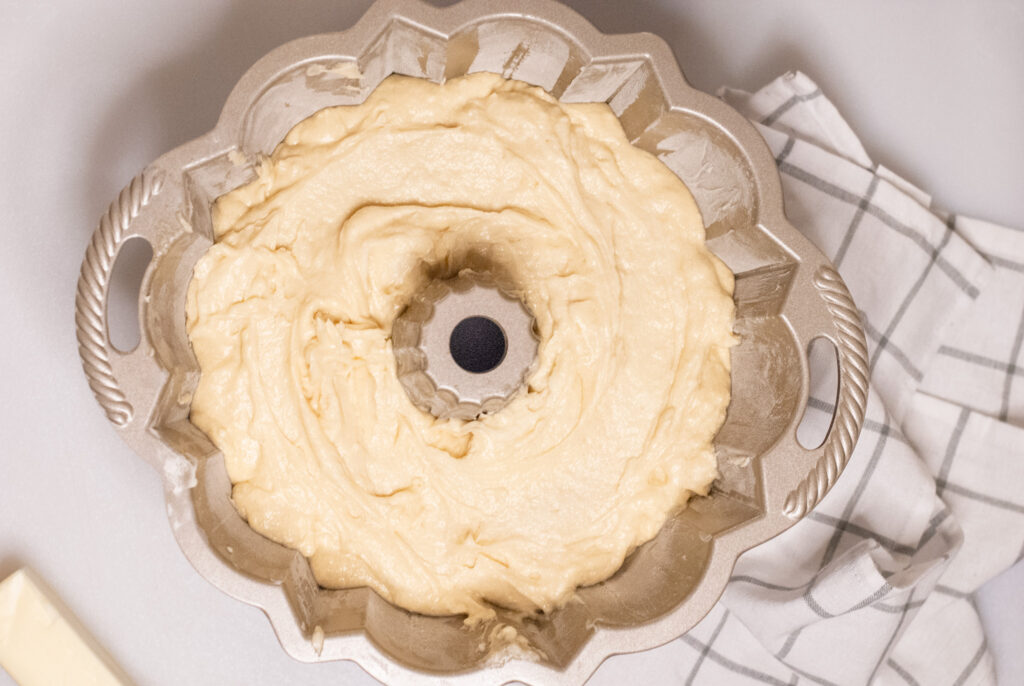 pound cake batter in a bundt pan