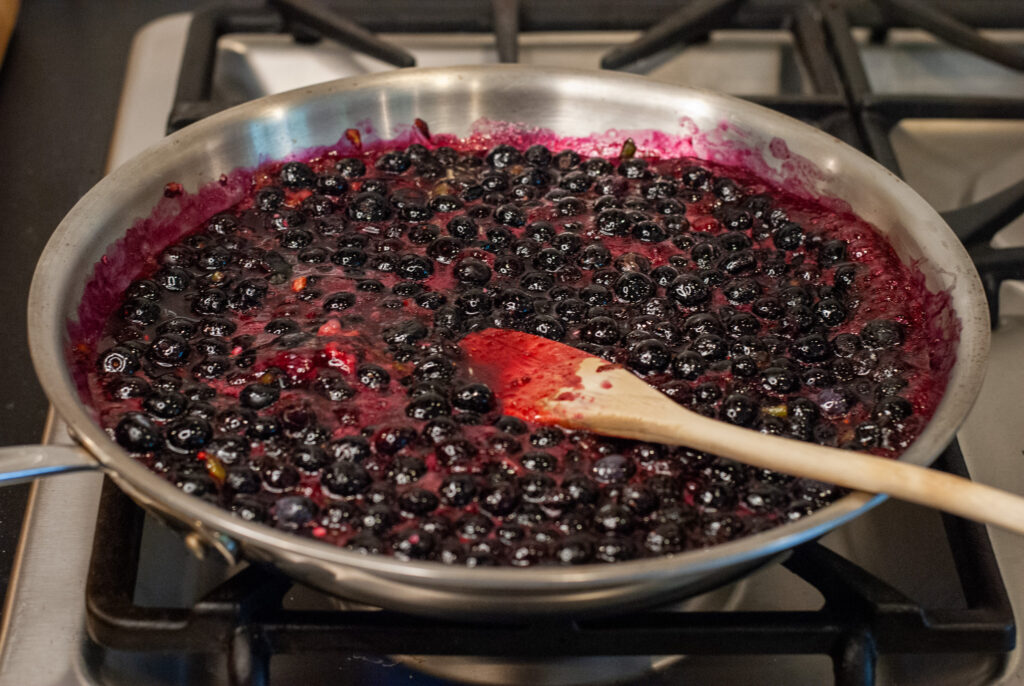 blueberries cooking in a sauce pan 