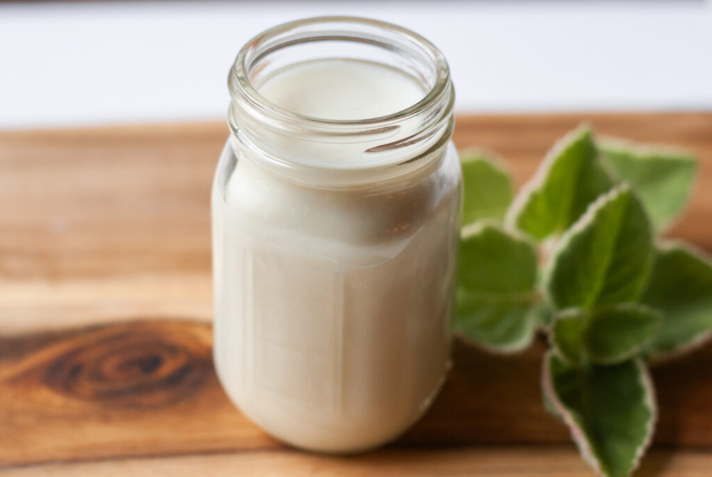 whipped lotion on a wooden surface 