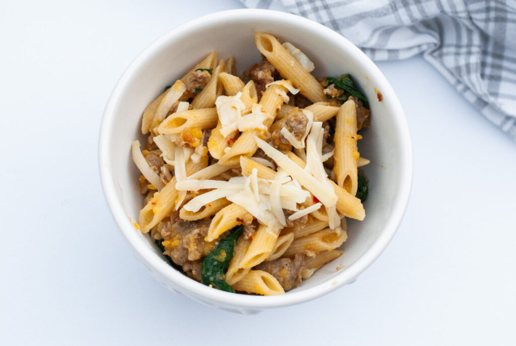 pasta in a white bowl on a counter 