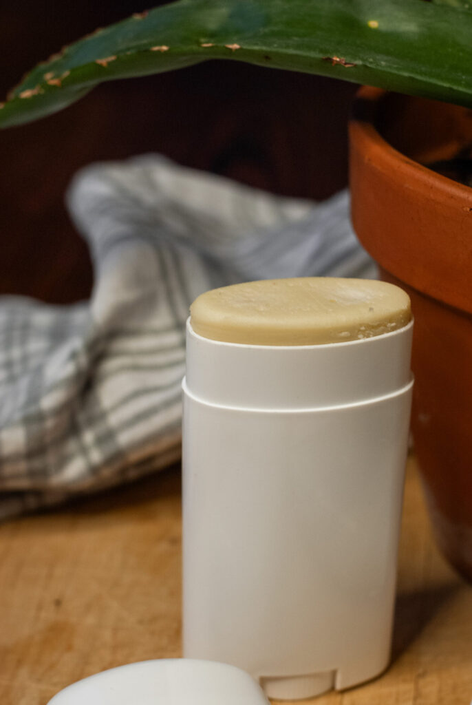 Natural magnesium deodorant on a wooden table. 