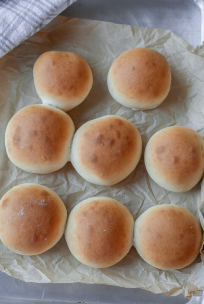 hamburger buns on a sheet pan